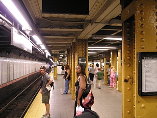 A standard local station with the platform in the middle.